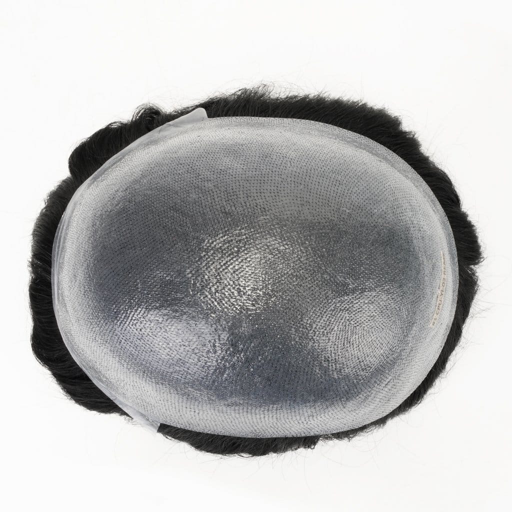 A close-up, high-quality photo of a thin, transparent polyurethane base hair system.